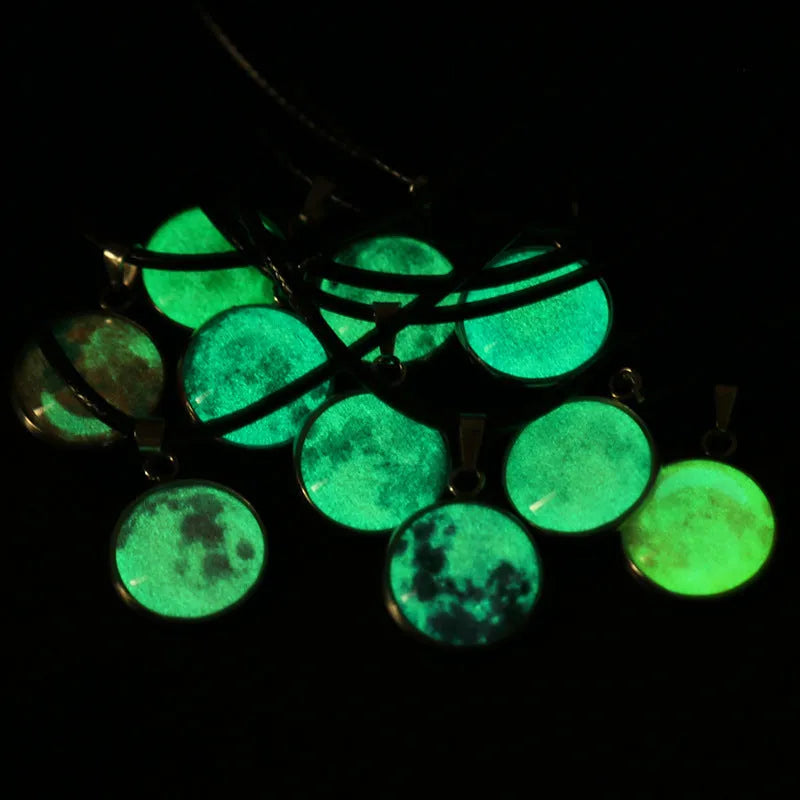 Luminous Christmas moon and starry night sky alloy pendant necklace with coloured glass centrepiece on a chain.