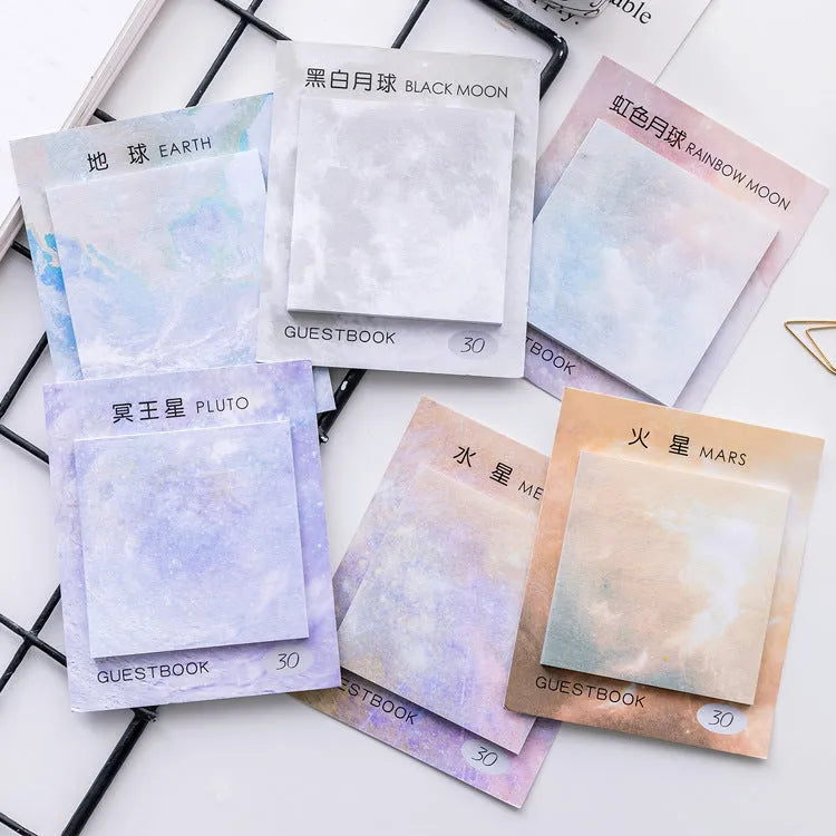 Square planet-themed sticky note pad measuring 7.3 by 7.3 centimetres.