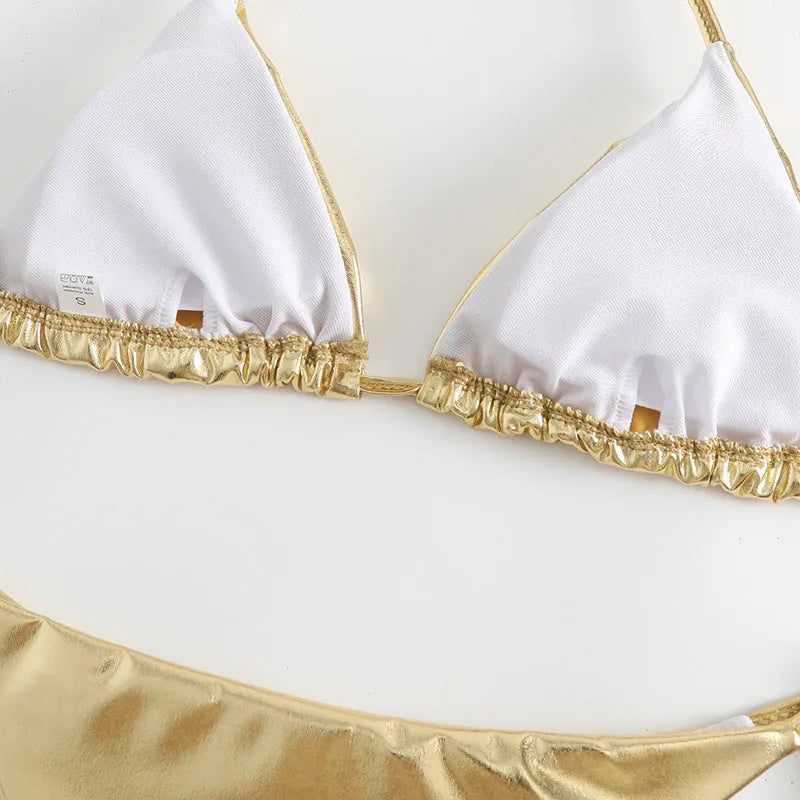 Women's lace-up bikini in metallic colour with adjustable ties and polyester fabric.