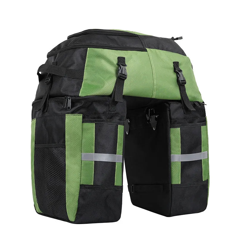 Rhinoceros large green bicycle rear pannier bag mounted on a bike rack for touring.