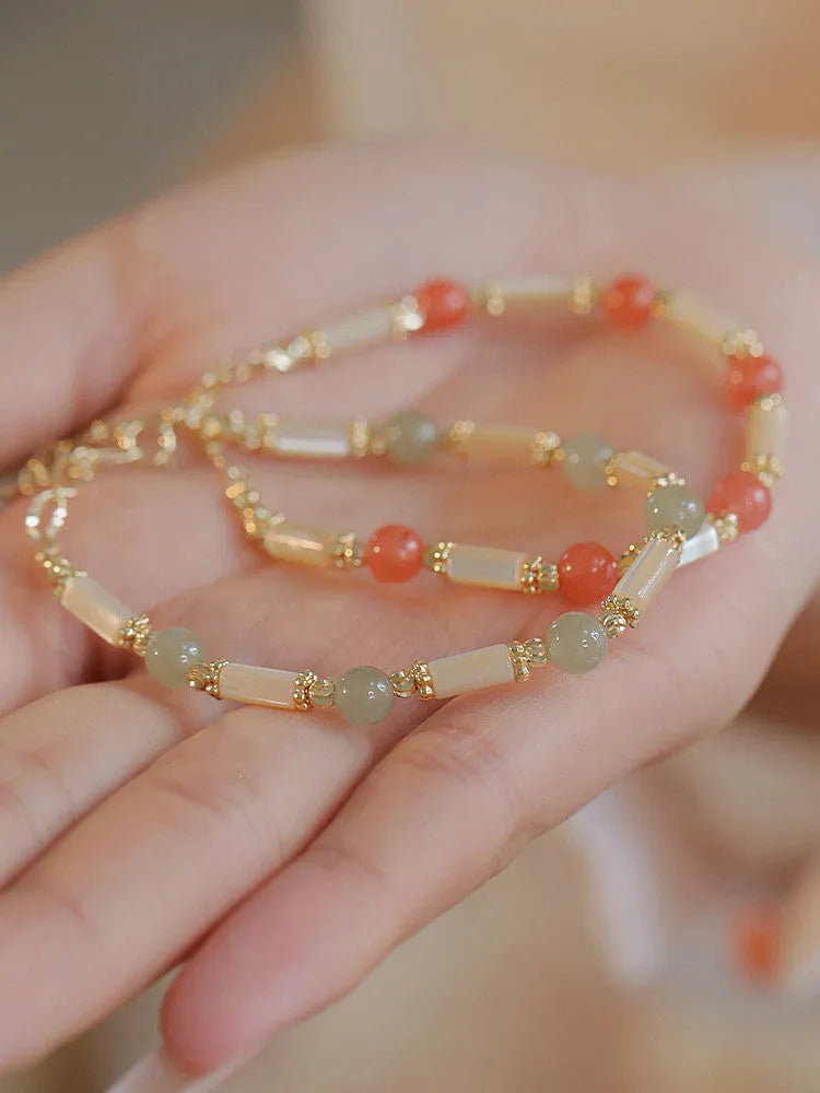 Women's bamboo joint Hetian jade bracelet in 6mm size showing natural stone beads