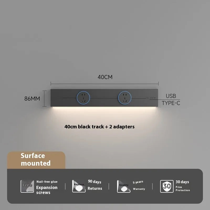 Induction lamp rail socket in black on a sideboard cabinet track with white background