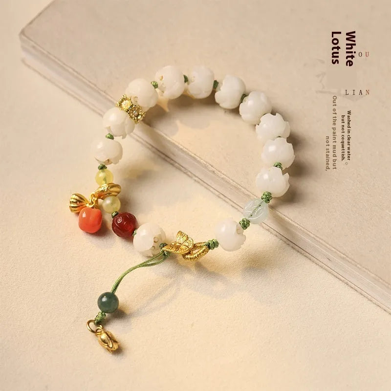 White jade bodhi bracelet with lotus and pumpkin beads on open rope