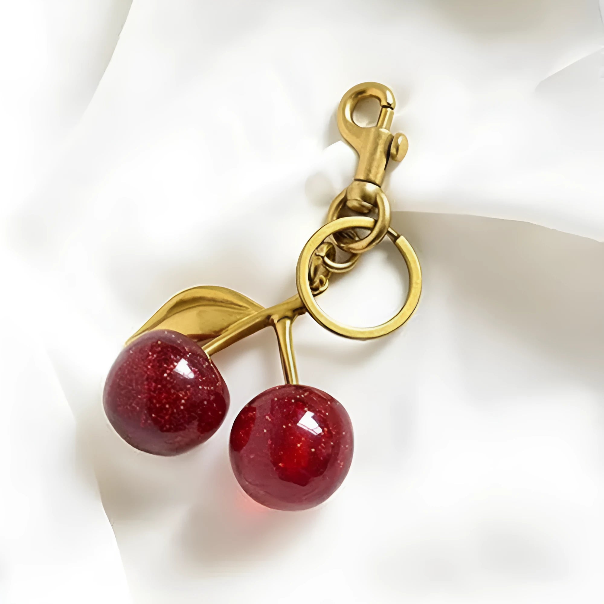 Zinc alloy cherry-shaped key pendant in pink colour with three-dimensional design for car keys or bag charms