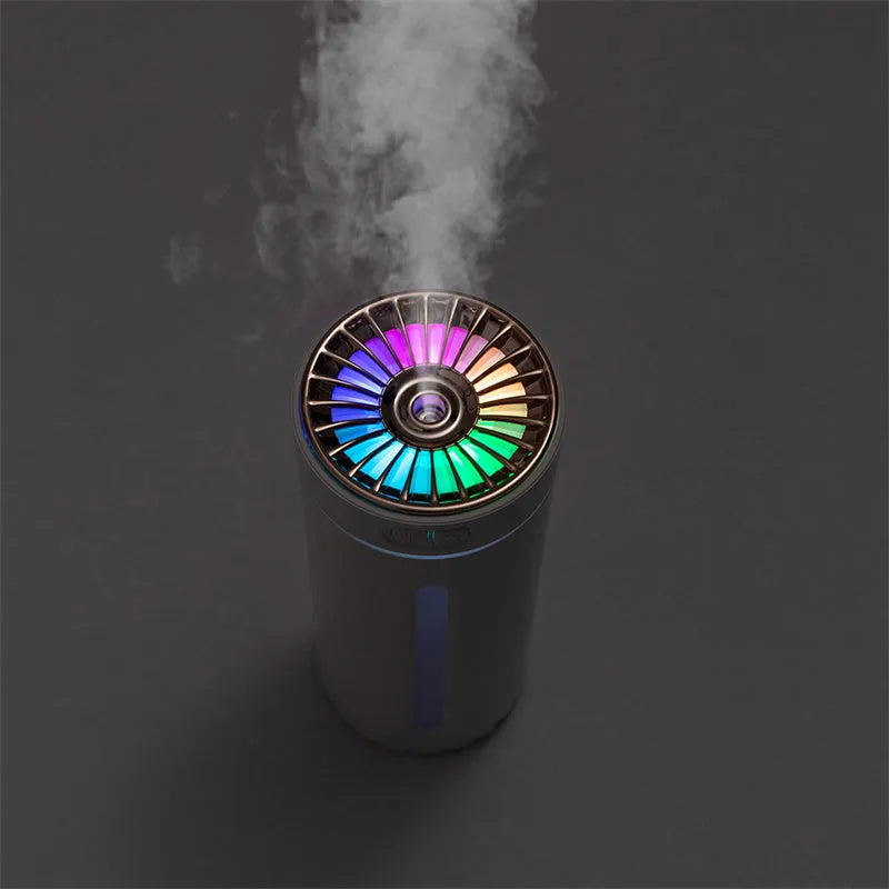 Black portable USB rechargeable humidifier with colourful LED lights on car cup holder