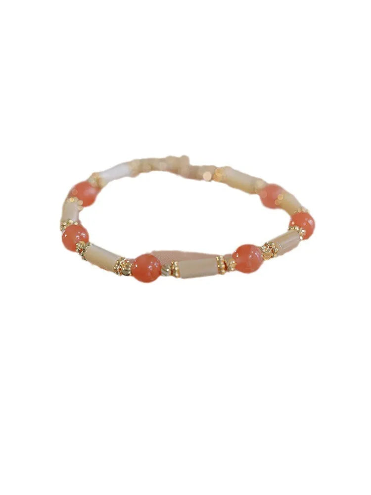 Women's bamboo joint Hetian jade bracelet in 6mm size showing natural stone beads