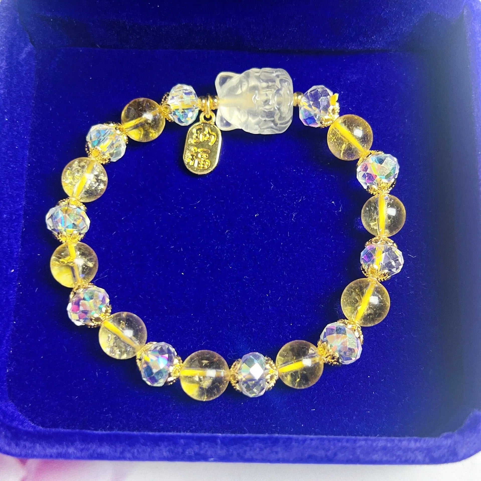 Women's crystal bracelet with a detailed nine-tail fox charm in natural citrine.