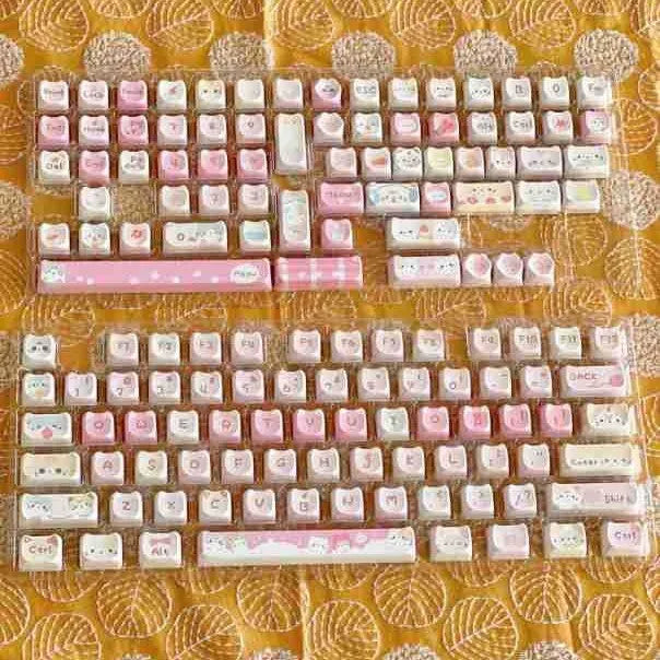 Meow Meow Team mechanical keyboard keycap set showing 141 plastic keys with sublimation printing on all sides