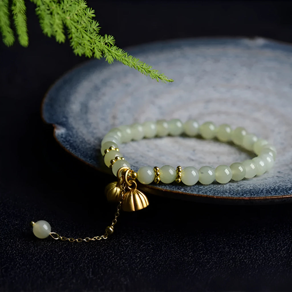 Two Shihuan natural Hetian jade bracelet with 6mm beads showing lotus and fu character designs