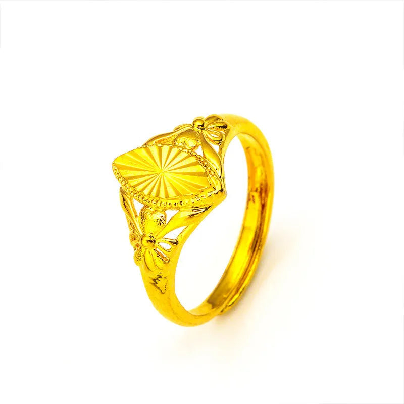 Alluvial gold electroplated brass ring with open diamond flower design and geometric texture