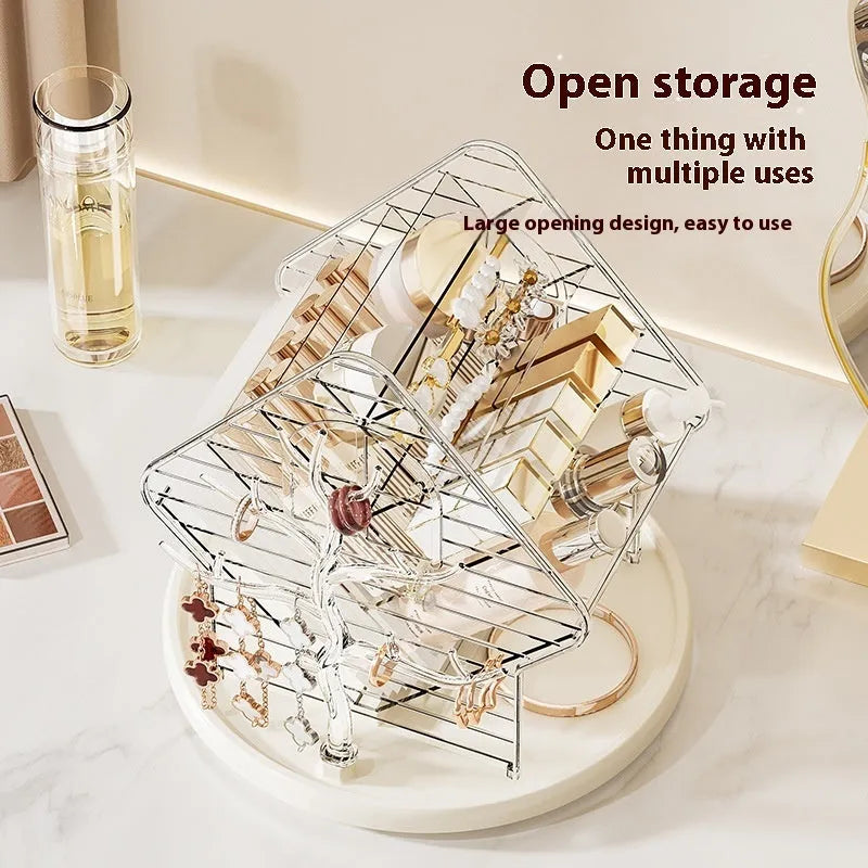 Clear and amber gold rotating plastic cosmetics storage box organiser on a table.