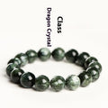 Natural green dragon crystal bead bracelet with geometric ruyi pattern on white background.