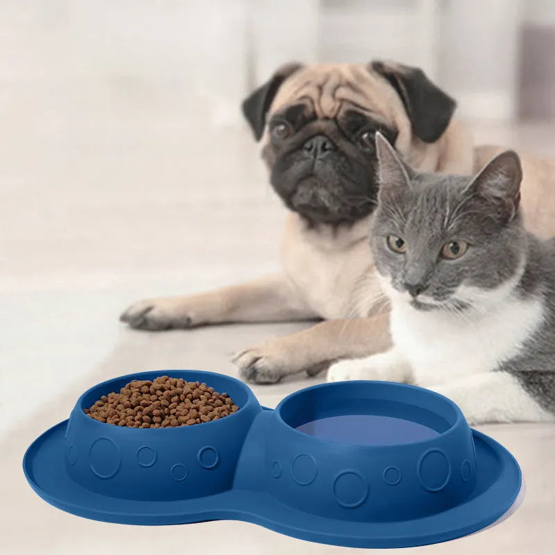 Blue non-slip silicone 2-in-1 pet feeding mat holding water and food bowls