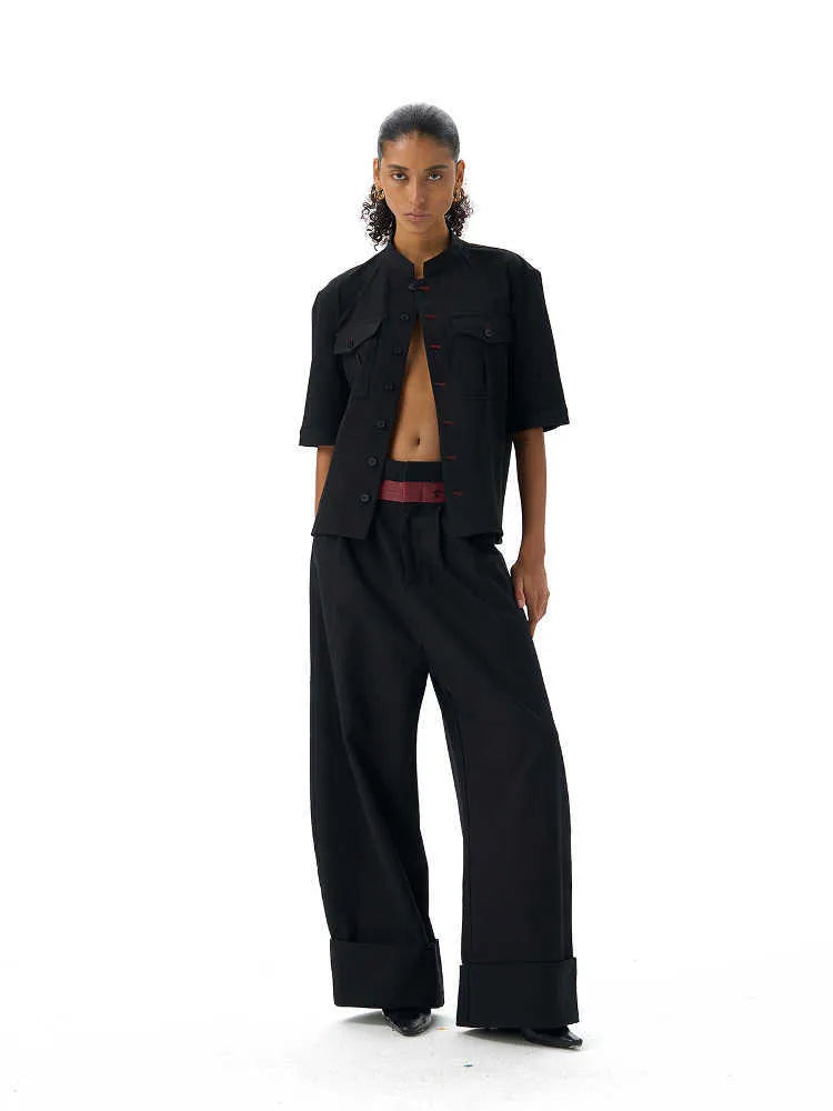 Black loose-fit half-sleeve hunting shirt with a shirt collar and handmade red eye design detail.