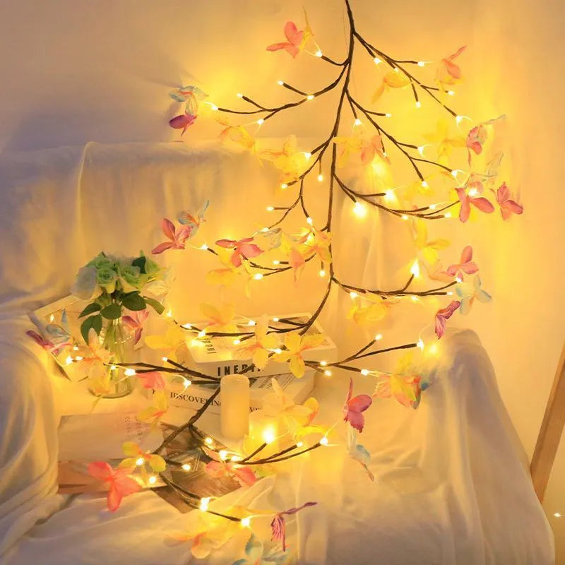 Flexible LED butterfly tree lamp with colourful ornaments on 1.8 metre rattan vines