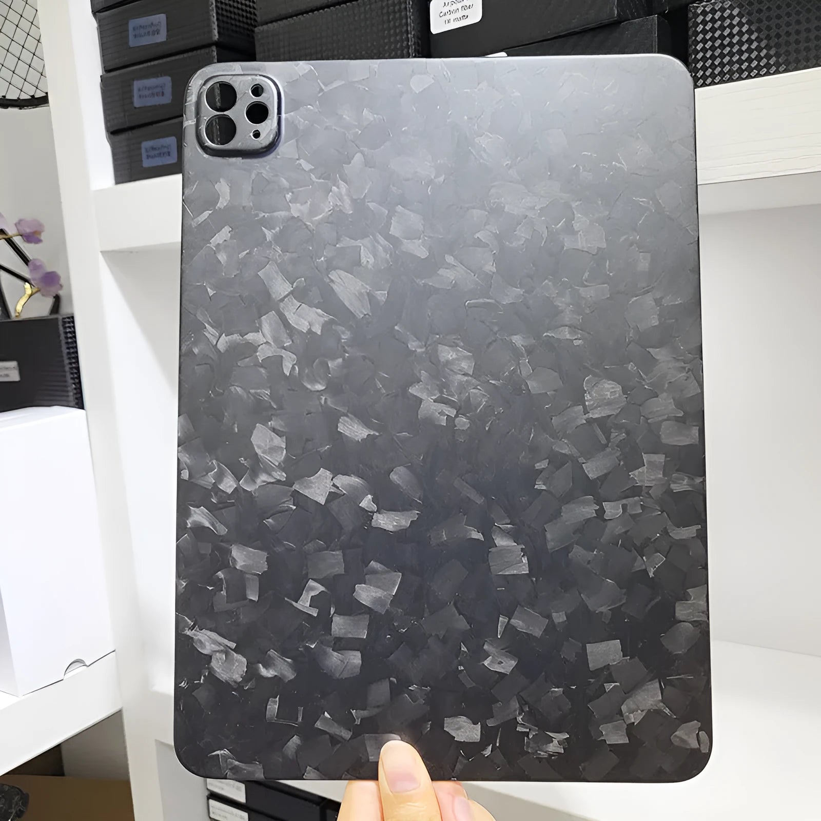 Real carbon fibre hard protective case for Apple iPad Pro 11 inch with embossed plaid design.