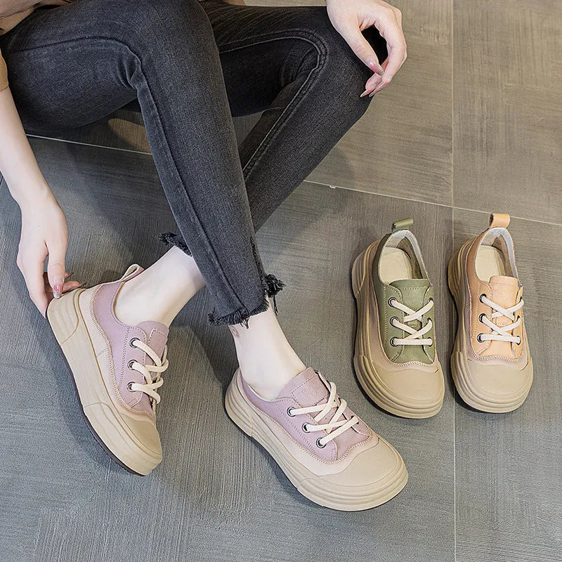 Women's leather platform sneakers in matcha green, purple and orange colours showing front lace-up design