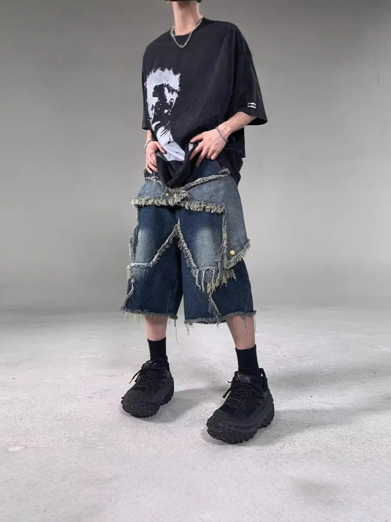 Blue denim shorts with frayed five-pointed star design detail, loose fit cut for summer casual wear