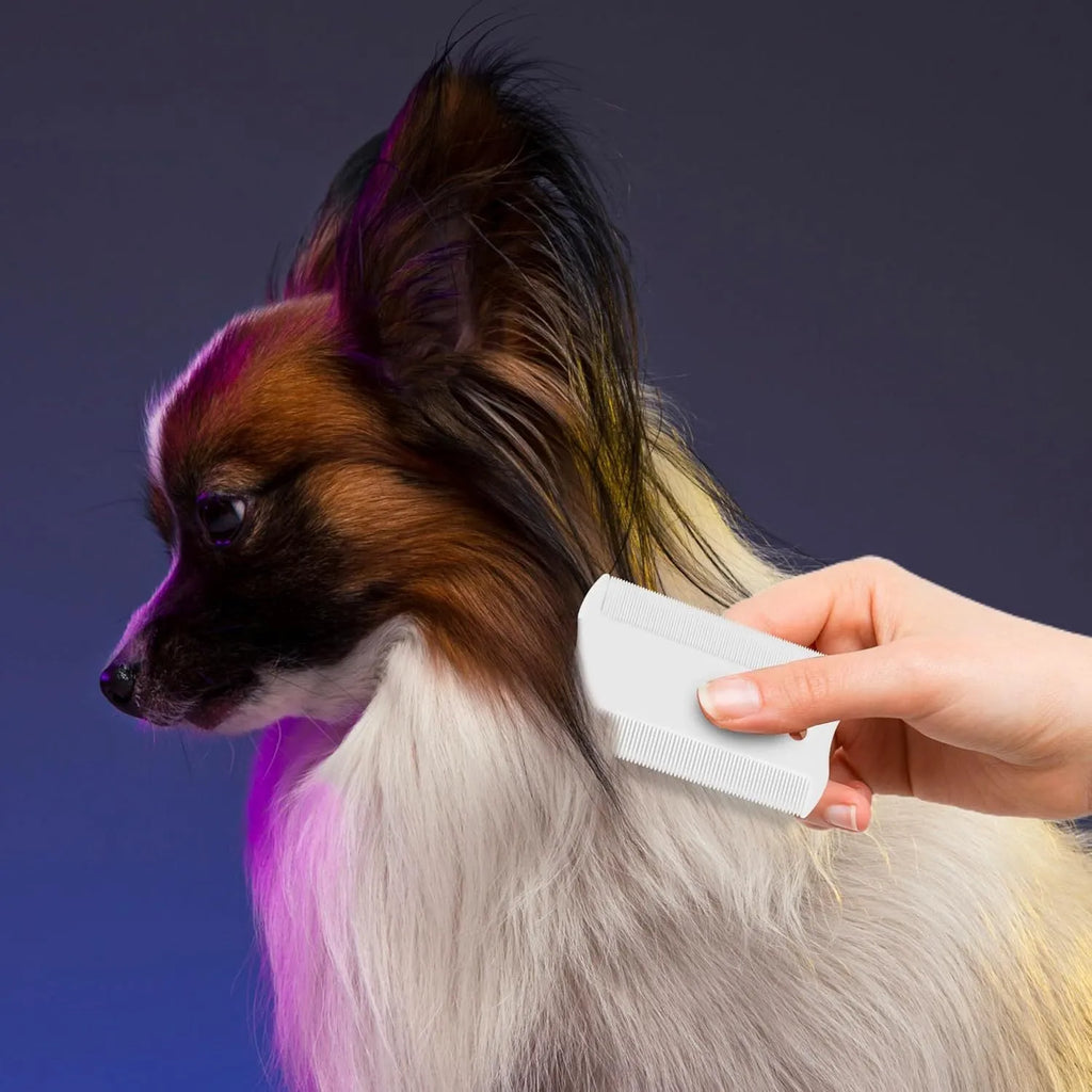 Double-sided plastic flea comb for pets showing dense teeth and 0.85cm width