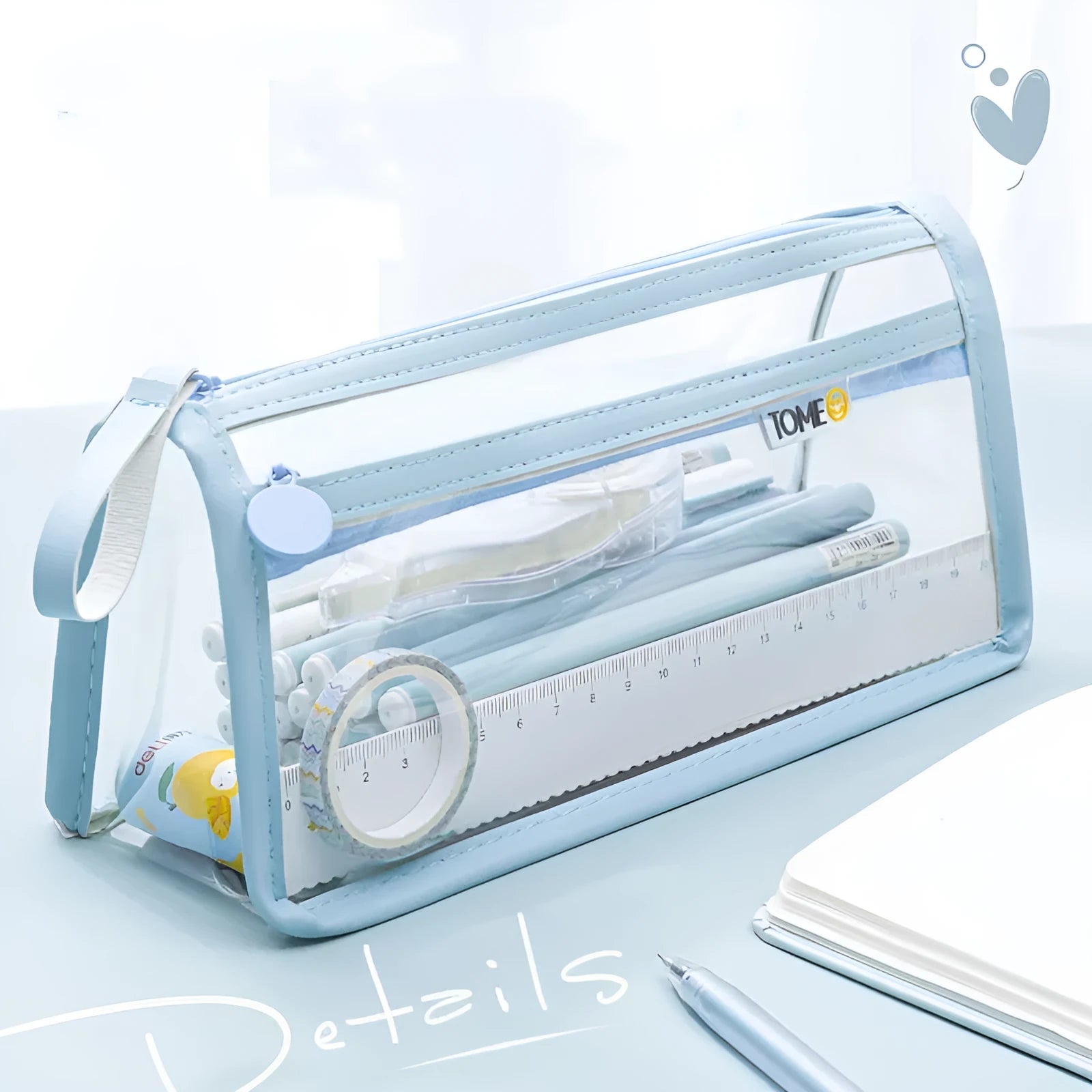 Transparent double-layer pencil case showing internal compartments and stationery organisation